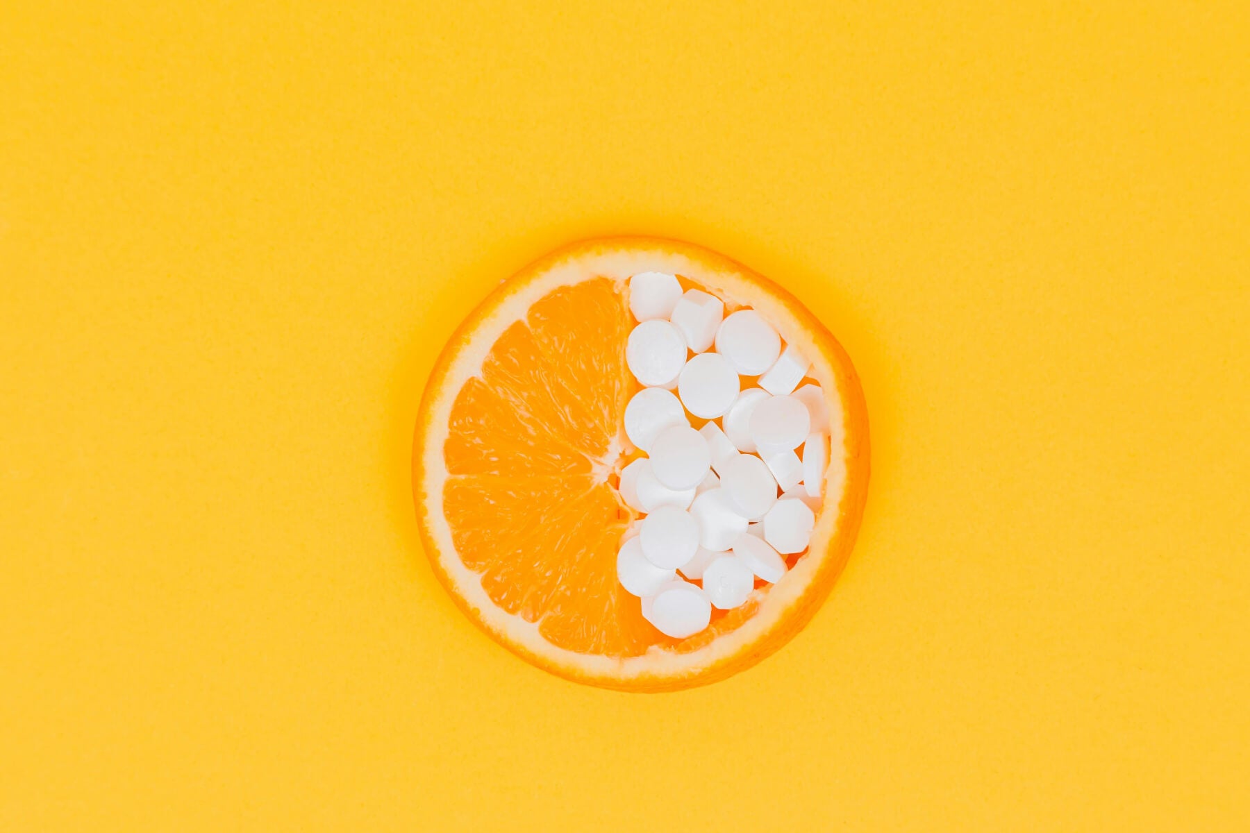 Orange with pills